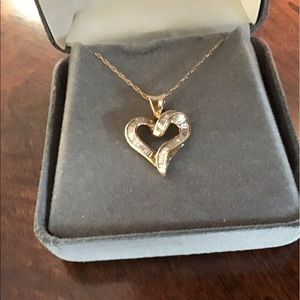 Gold and baguette diamond heart pendant